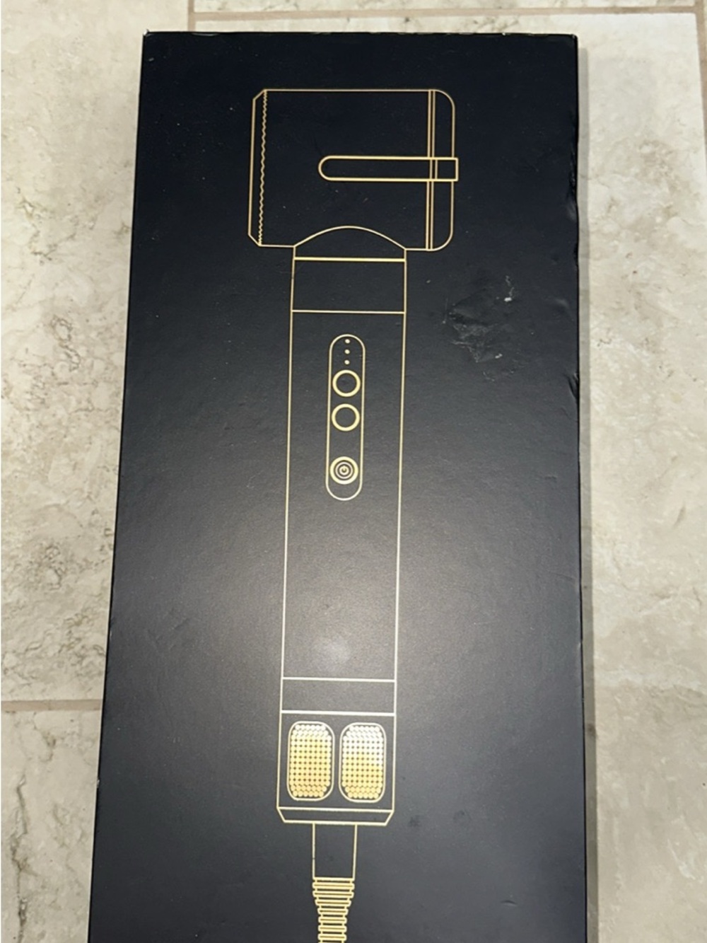 Women's Black and Gold Hair Styling Tool